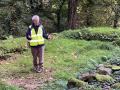 Our walk leader standing in the remains of a Keeill